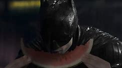 batman eats watermelon at the subway