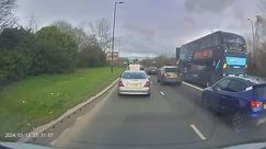 Shocking footage shows bus ploughing into car after impatient driver pulls out into bus lane