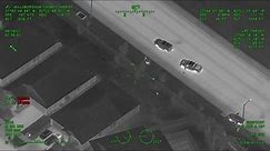Florida police helicopter films officers chasing home invasion suspects
