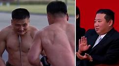North Korean leader watches extreme martial arts performance – video