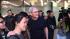 Apple CEO Tim Cook walks the iPhone 6 line in Palo Alto