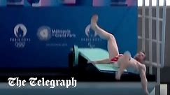 French diver slips and falls during Olympic inauguration ceremony