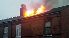 Dramatic scenes as flames engulf a house in Witton