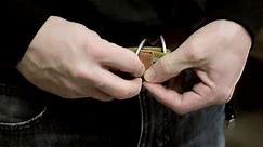 How to Buckle a Belt With Two Loops