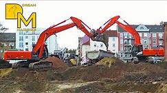 2x HITACHI ZAXIS 350 crawler excavators cleaning up after demolition