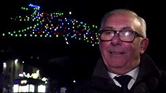 Italian town lights up world's largest Christmas tree