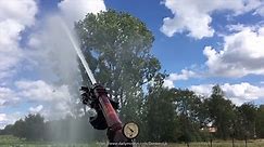 Slowmotion: Sprinkler gun with irrigation reel