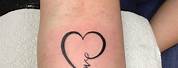 Infinity Symbol with Heart Tattoo