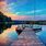 Lake with Boat and Dock Wallpaper