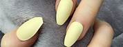Pastel Yellow and Gold Nails