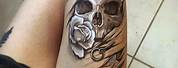 Skull and Rose Tattoo On Thigh