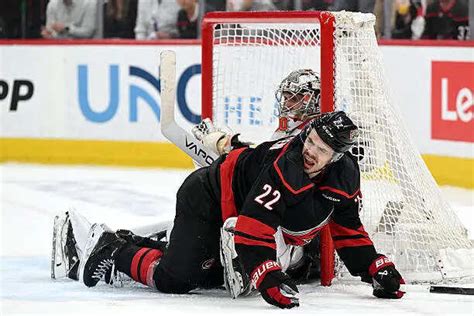Philadelphia Flyers goaltender Dan Vladar confronts Logan Stankoven ...