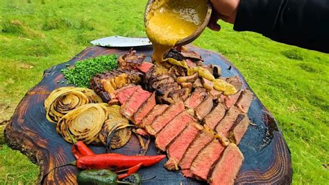Juicy steak cooked on a rock became the ultimate bushcraft meal