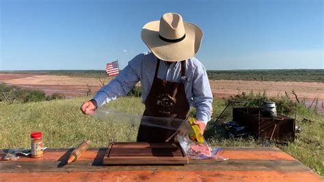 An old-school grilled burger dog for a backyard cookout