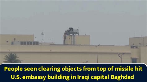 People seen clearing objects from top of missile hit US embassy ...