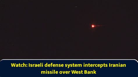 Watch: Israeli defense system intercepts Iranian missile over West Bank