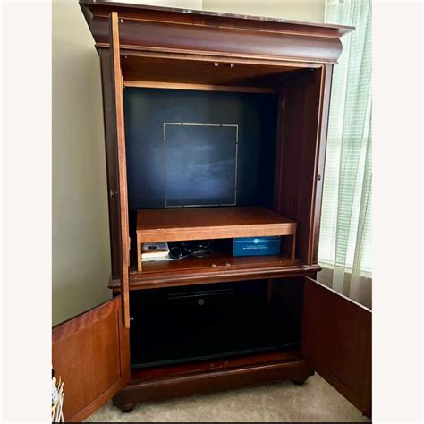 Dark Brown Wood Armoire - AptDeco