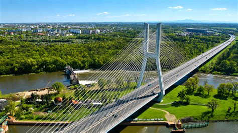 A modern architectural landmark standing above Warsaw’s skyline