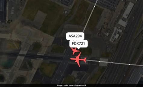 Close call: Two planes nearly collide during landing at US airport