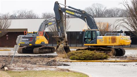 Fences, equipment placed for upcoming demolition on Elwood and Portage