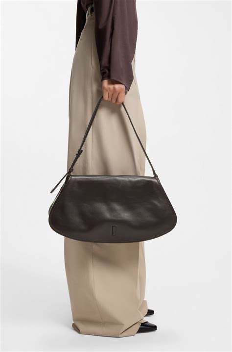 BOSS - Ariell shoulder bag in leather with adjustable strap - Dark Brown