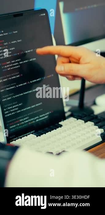 Programmer Pointing Code Screen Workspace, software development process ...