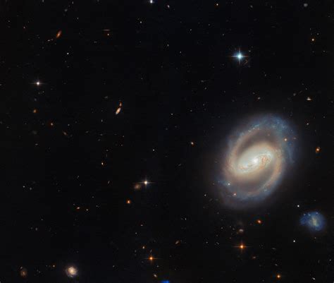 Hubble Spies an Active Spiral - NASA Science