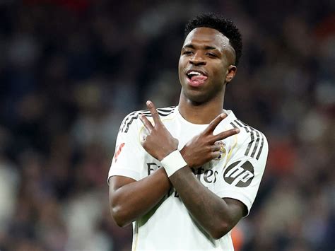 Vinicius Jr bags brace as Real Madrid beat Real Sociedad to claim top ...