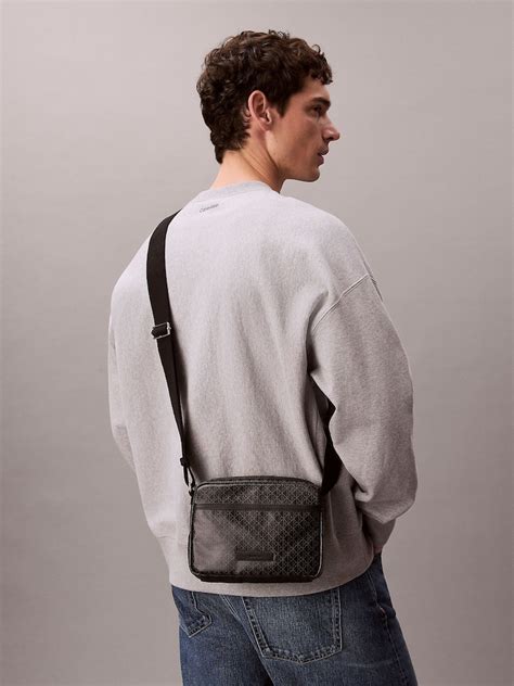 Buy Calvin Klein Black Coated Fabric Cross-Body Bag from Next India