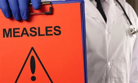 Children face being forced to take three weeks off school as measles ...