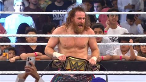 After Causing Mayhem for Weeks, Sami Zayn Is Finally WWE Champion - AOL