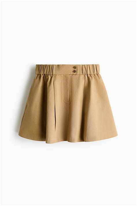 Flared mini skirt - Dark beige - Ladies | H&M IN