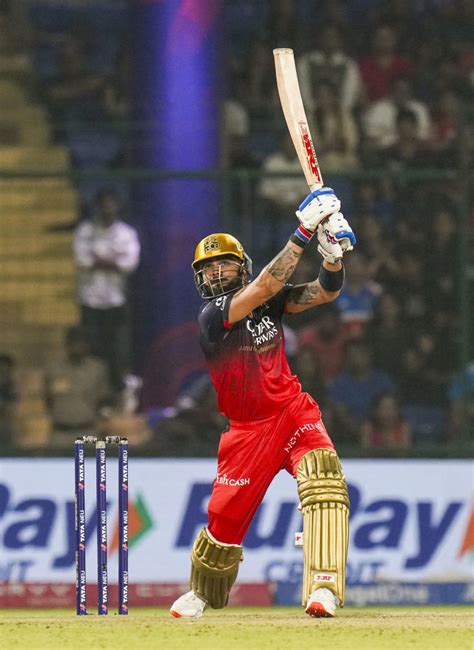 Krunal's rare IPL fifty helps RCB beat DC and extend unbeaten away run