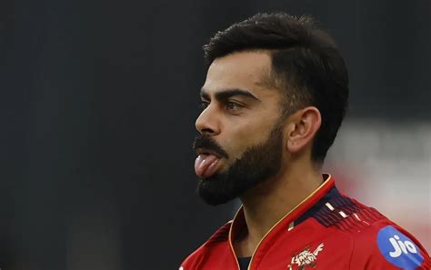 Holder's low catch sparks Kohli's protest and rule debate