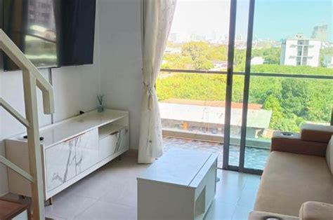 Loft-style condo for sale with city views, Thai quota, Laguna Beach ...
