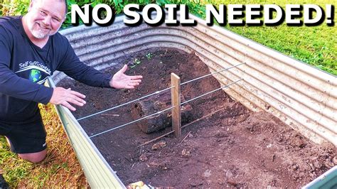 How to fill a raised garden bed without soil & grow potatoes! | Layered ...