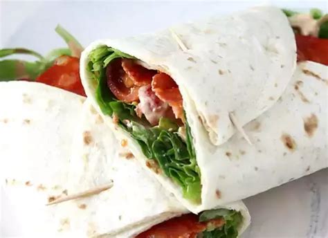 Chorizo, avocado, and tomato wrap sandwich