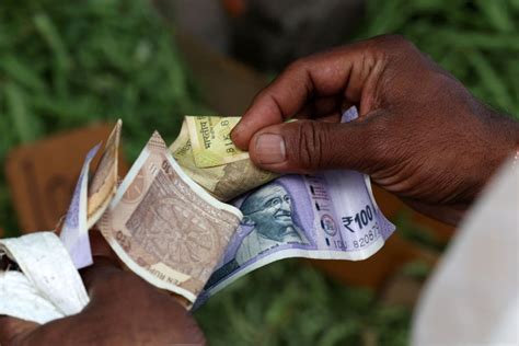 Rupee ends flat as importer dollar demand offsets early gains ...