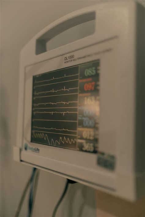 Medical Monitor Displaying Heart Rate and Vitals · Free Stock Photo