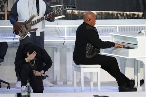 Super Bowl Halftime: Dr. Dre Leads A-Team, Eminem Takes a Knee