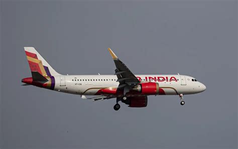 Air India defers pay hikes, cuts routes as losses mount
