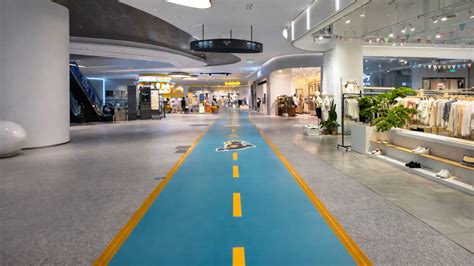 Spacious interior in China mall uses road style path for movement
