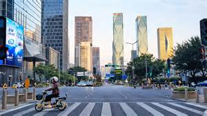 Futuristic towers surround Shenzhen streets