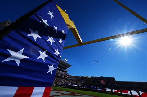 Parachuter crash-lands before Armed Forces Bowl game between Texas ...