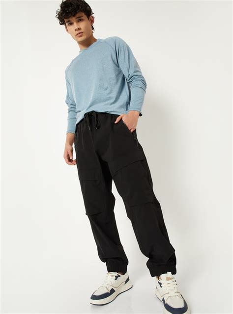 Buy Men Solid Athleisure Joggers Online at just Rs. 1299.0 ...