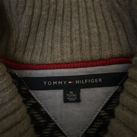 Tommy Hilfiger knit sweater with geometric patterns... | Depop