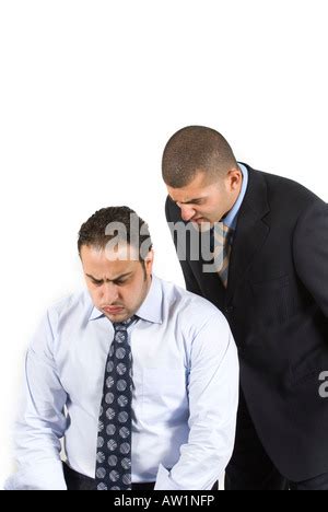 photo of businessmen arguing with aggression. two arguing businessmen ...