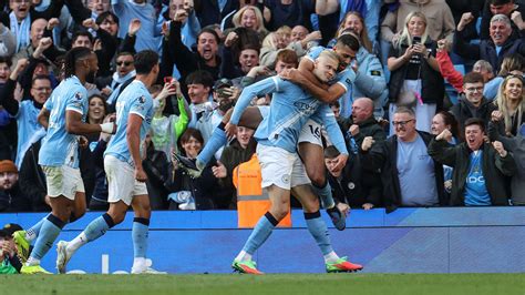 Wayne Rooney criticises Man City's 'over the top' celebrations after Arsenal win & thinks it ...