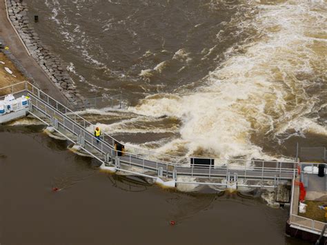 Northern Michigan river flooding stresses dams in Cheboygan, Mio