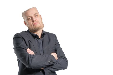 Premium Photo | Bald man with a square head in a gray suit with arms ...